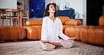 Breathing, woman and meditation in home, mindfulness and zen with spiritual awareness in living room. Calm, mature person and wellness on break, self care and inner peace for mental health in house