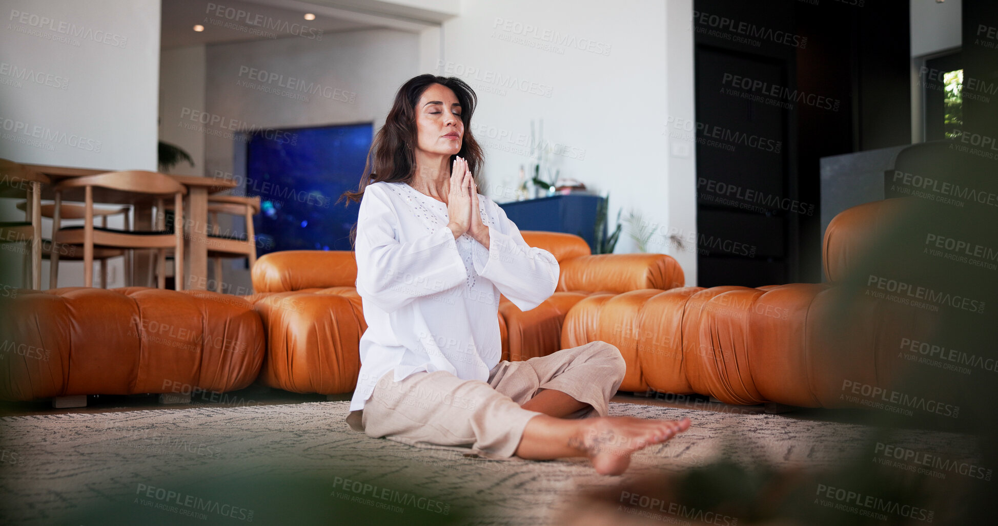 Buy stock photo Yoga, hands together and woman in lounge to relax, meditation and breathing exercise. Home, yogi and mature person on floor, mindfulness and fitness for holistic healing, chakra and zen for peace