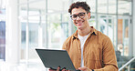 Man, laptop and smile in portrait at startup with pride, glasses or project management at media company. Person, tech and happy with pc for proposal, feedback and report at creative agency in Mexico