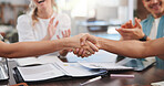 Business people, meeting and handshake with applause in office for agreement or partnership. Group, employees or shaking hands with team for b2b, project success or achievement together in workplace