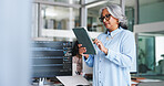 Woman, reading and tablet for programming in office for research, software manual and coding. Mature person, space and troubleshooting with digital, website maintenance and debugging system of server