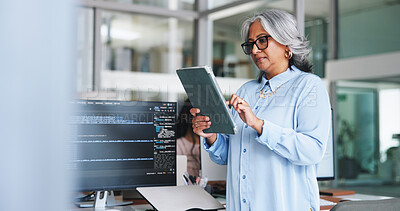 Buy stock photo Woman, reading and tablet for programming in office for research, software manual and coding. Mature person, space and troubleshooting with digital, website maintenance and debugging system of server