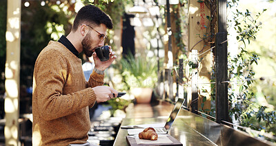 Buy stock photo Coffee, laptop and remote work with businessman at restaurant for small business research. Computer, drink and planning with freelance employee at outdoor cafe for startup development or report