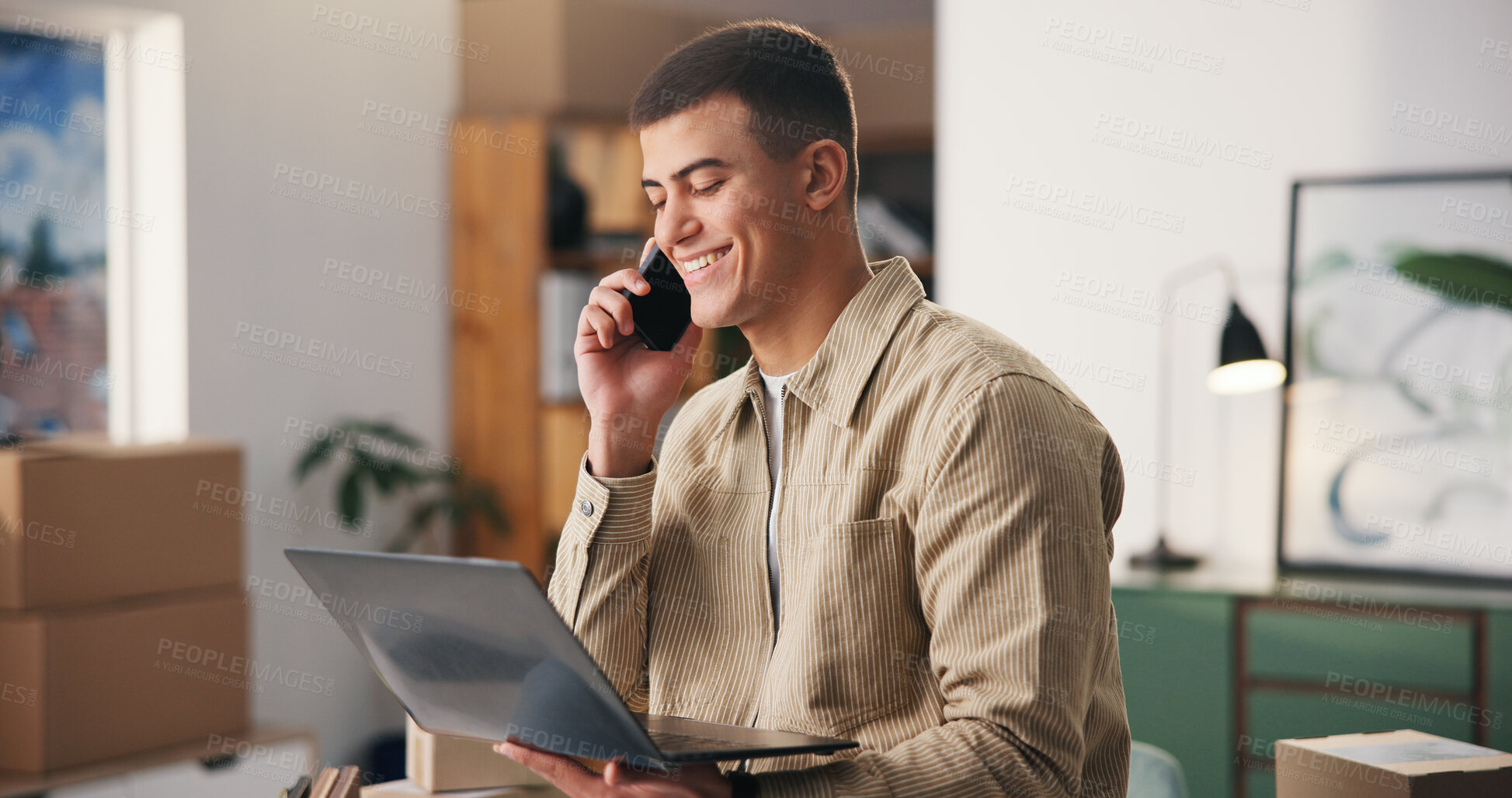 Buy stock photo Phone call, ecommerce or man in office with laptop, package track or conversation on shipping update. Logistics, smile or supplier with tech, stock or delivery checklist in cargo distribution.