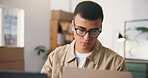 Man, thinking and laptop with glasses for logistics, courier service or seller in small business. Distributor, supplier and tech with info for delivery order, shipping or e commerce startup in office