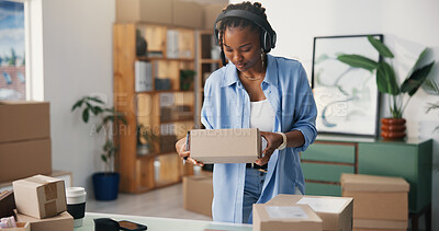 Buy stock photo Boxes, headphones and black woman in office, startup for ecommerce and app for radio. African person, cardboard and entrepreneur in workplace, sound and listening to music, audio and album playlist