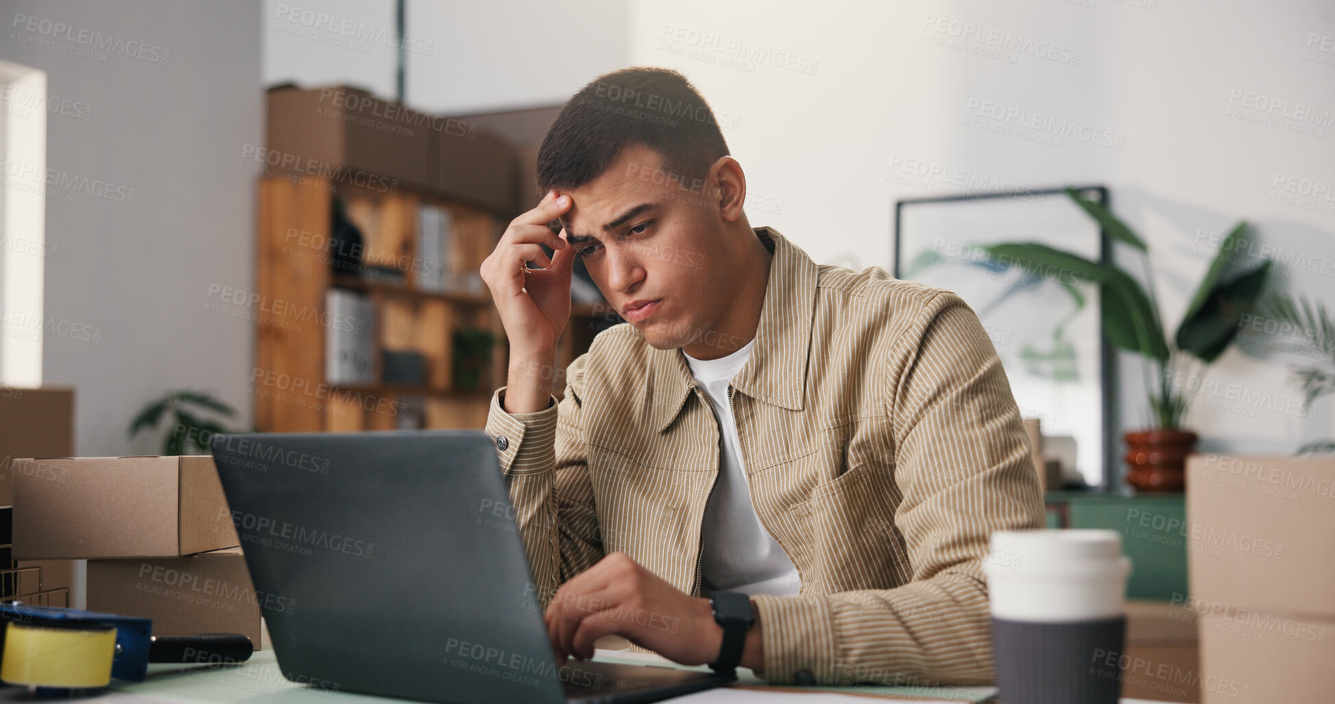 Buy stock photo Logistics, man and headache in office with laptop, ecommerce stress and bad review for distribution. Exhausted, person and migraine in workplace with computer, shipping delay or supply chain backlog.
