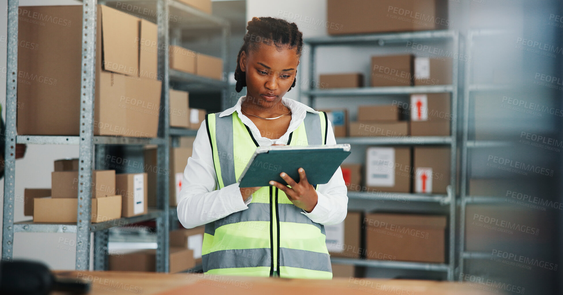 Buy stock photo Logistics, reading or woman with tablet in warehouse, distributor schedule or stock shipment notification. Inventory management, tech or African worker with supplier email, supply chain or timetable