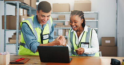 Buy stock photo Happy, business people or success with laptop in logistics for winning or congratulations together. Excited, man or woman with smile, boxes or computer for good news or supply chain in workplace