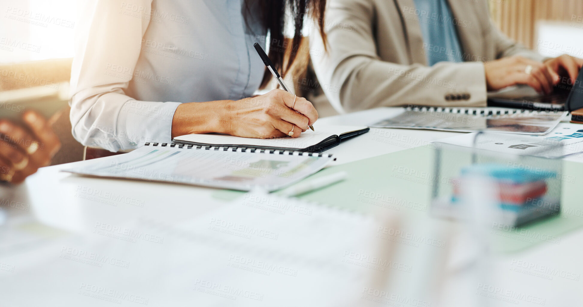 Buy stock photo Hands, meeting and writing with business person in office boardroom for collaboration or planning. Notebook, pen and workshop with employee at desk in workplace for project management or schedule