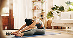 Woman, stretching and fitness on floor at house with exercise, start training and wellness. Female person, warm up and getting ready for pilates, morning performance and flexibility of stress relief 