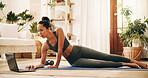 Laptop, search and yoga with woman in living room of home for break, holistic wellness or video. Computer, exercise and tutorial streaming with yogi person on floor in apartment for health activity