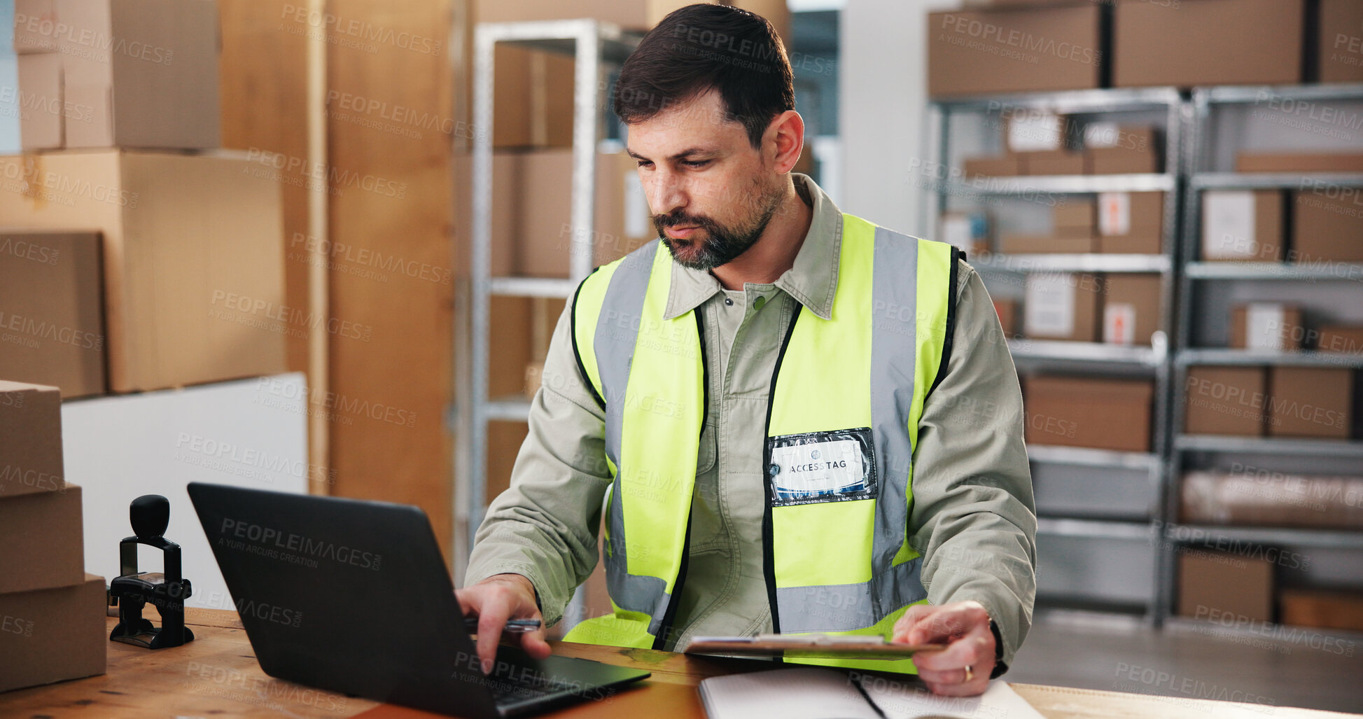 Buy stock photo Supply chain, laptop and man in warehouse, reading and email for inventory management. Internet, logistics and person in factory, pc and website info for distribution, export and schedule for backlog