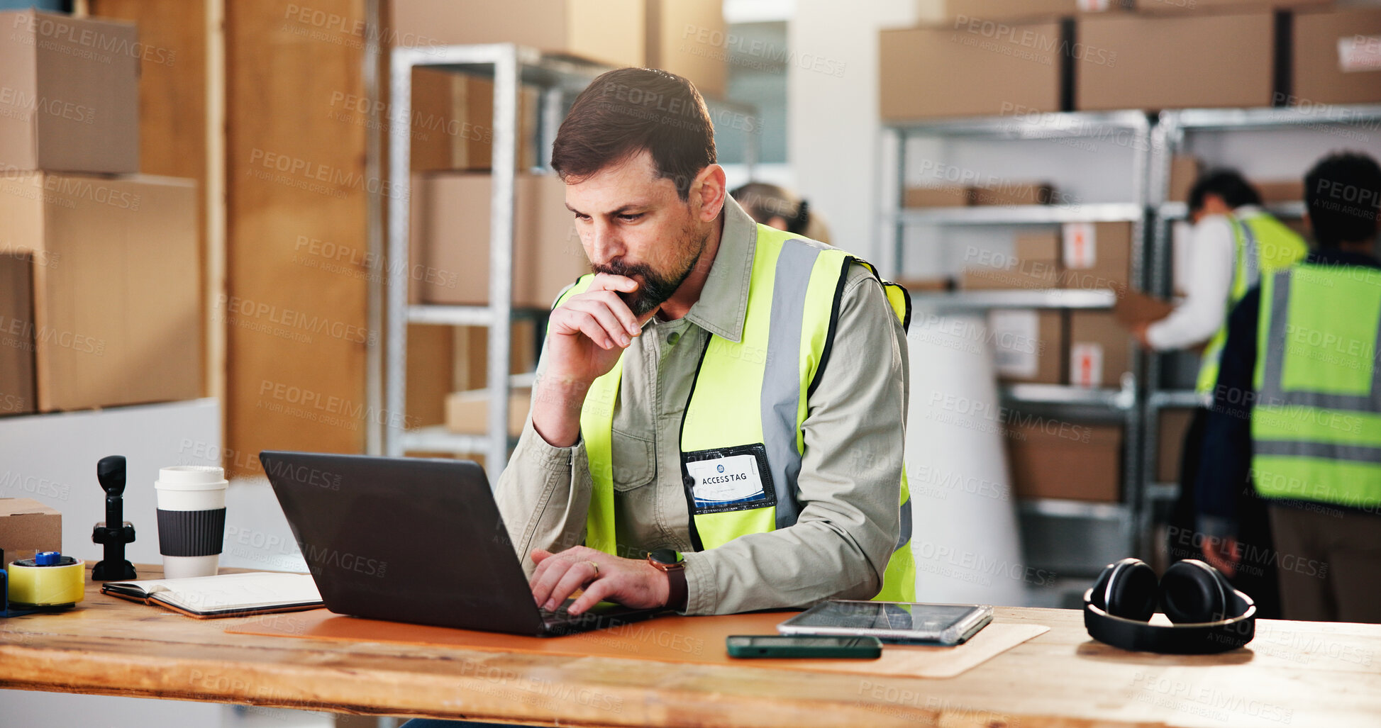 Buy stock photo Logistics, man and reading in warehouse with laptop, problem solving and email for shipping update. Supply chain, person and thinking in depot with computer, courier app and website for online order.