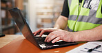Logistics, man and hands in depot with laptop, typing report or shipping email for distribution. Supply chain, person and browsing in warehouse with computer, courier app or website to track package.