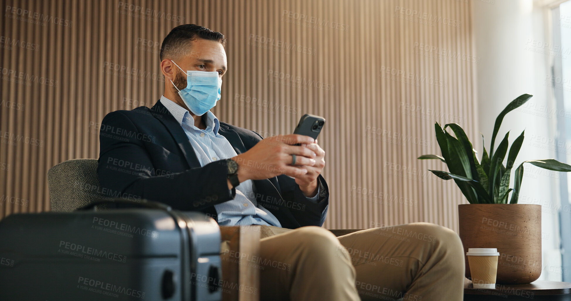 Buy stock photo Investor, mask and man in airport, smartphone for online flight schedule or communication Person, message to contact or trader on chair, cellphone or email for visa application or global trading deal