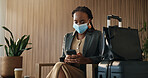 Investor, typing and black woman in airport, smartphone for online boarding pass and social media. Person, mask or trader on chair, cellphone and email for visa application or app for flight schedule