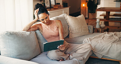 Buy stock photo Woman, relax and watching movie in home with tablet, online subscription and media on weekend. Female person, chill and streaming service on sofa with tech, digital app and website for film.