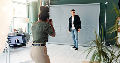 Buy stock photo BTS, film or media with model and photographer in studio for creative production or photoshoot. Camera, laptop screen or photography process with man and woman behind the scenes for catalog campaign