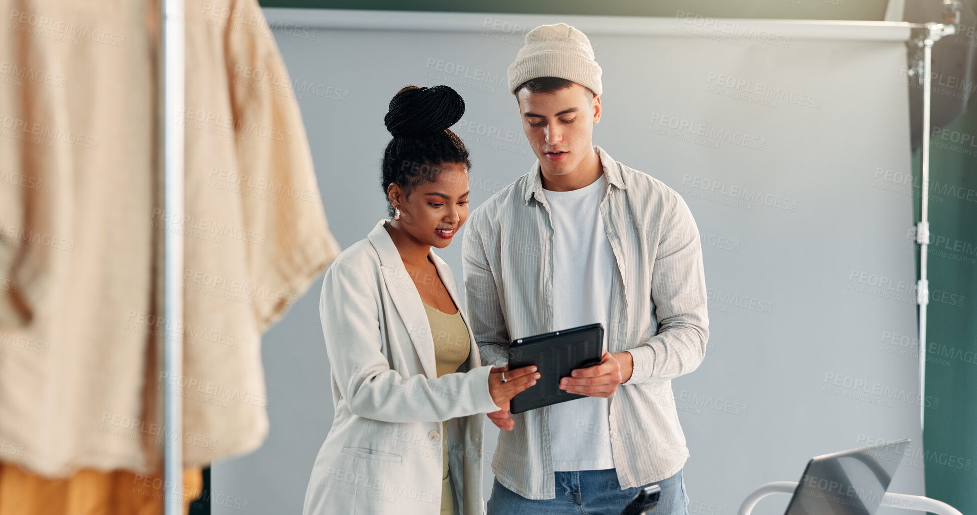 Buy stock photo Photography, tablet and review with people in studio together for production planning or teamwork. App, photoshoot or talking with photographer man and woman on set for film or media feedback