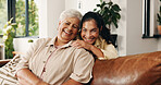 Portrait, senior mother and woman on sofa with smile, love or laugh together in living room. Home, elderly mom and adult daughter with happy family, funny or bonding for connection with embrace