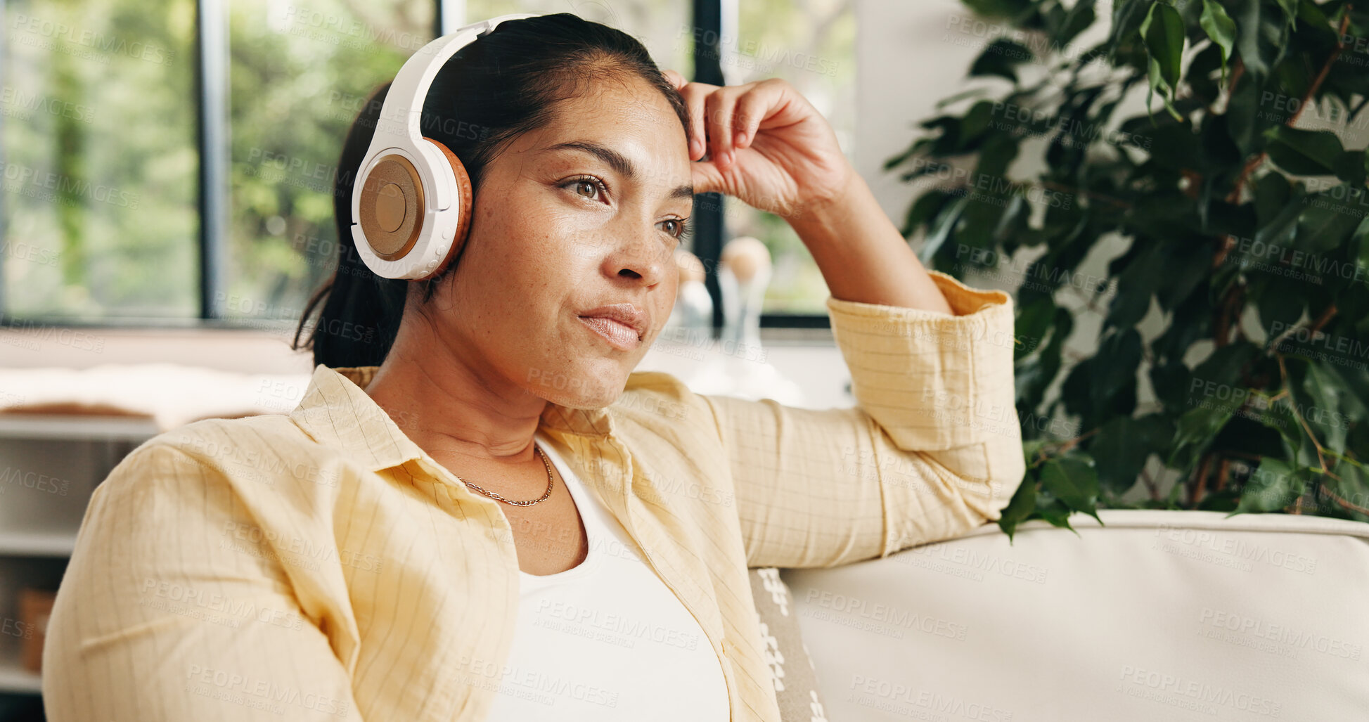 Buy stock photo Woman, relax and thinking in living room with headphones, podcast and listening to music for nostalgia. Mature person, reflection and remember memory in home with audio tech, online radio and song.