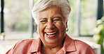 Portrait, senior woman and laugh at house with peace, calm morning and comfortable on sofa. Smile, elderly person and relax with joke, positive attitude and weekend break on retirement in living room