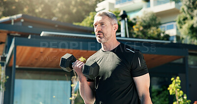 Buy stock photo Bodybuilder, man and outdoor with dumbbells for workout, muscle development and health. Athlete, training and mature person with weights for fitness by home for endurance, challenge and exercise