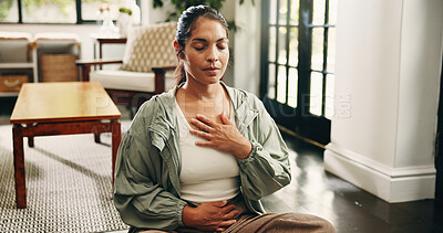 Buy stock photo Yoga, woman and breathing in home with meditation, chakra healing and peace for wellness. Zen, mature person and mindfulness in living room with breathwork, spiritual awareness and holistic health.