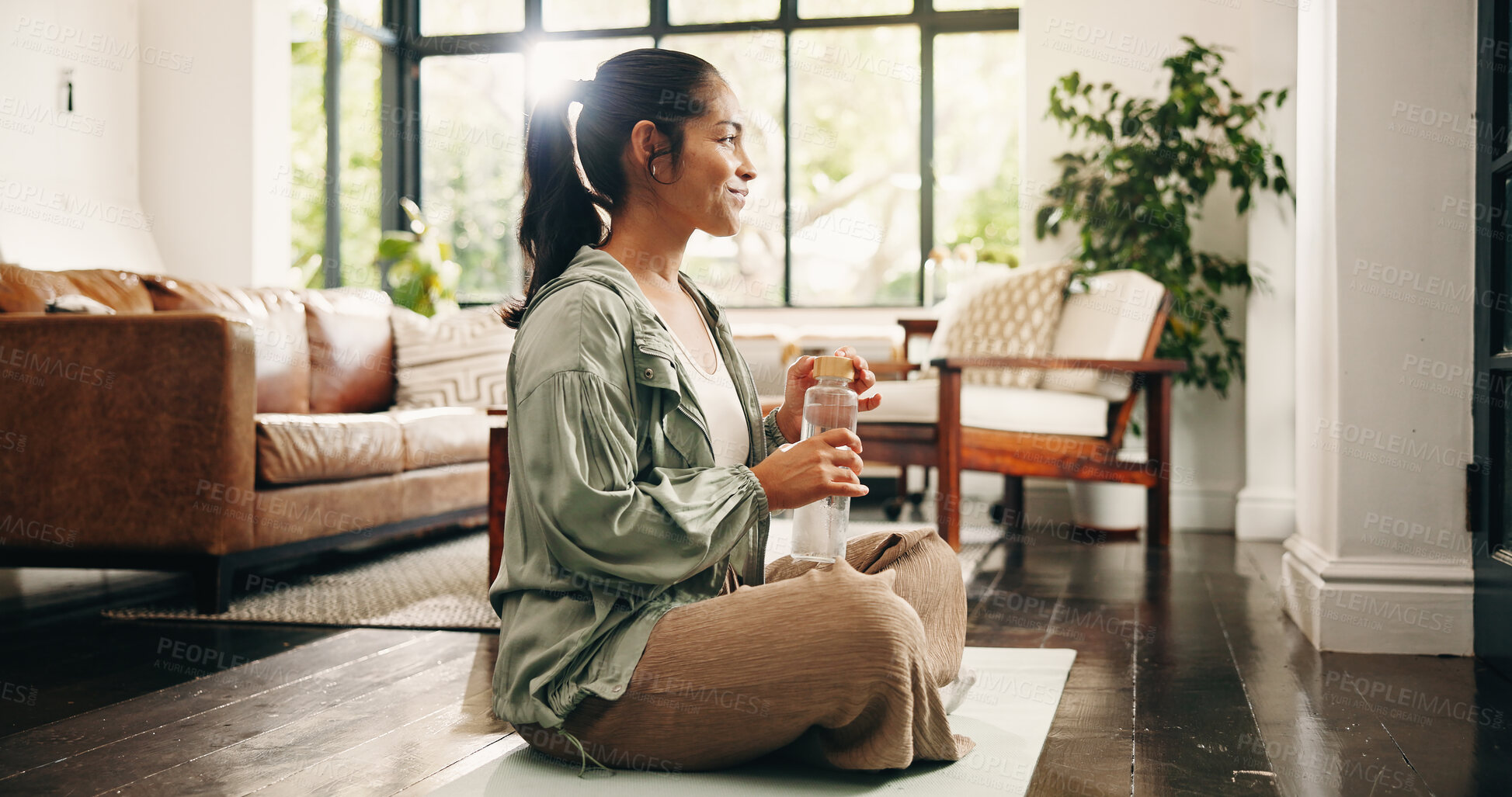 Buy stock photo Yoga, rest and woman in house with water, hydration and health detox in wellness activity. Break, flare and female person in home with bottle, calm practice and h2o refresh in holistic hobby.