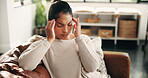 Pain, woman and headache on sofa in house with discomfort, temple massage or mental fatigue. Pressure, mature person and migraine in home with stress, brain fog and overwhelmed by uncomfortable ache