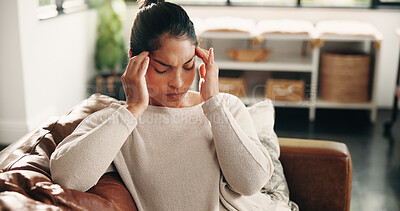 Buy stock photo Pain, woman and headache on sofa in house with discomfort, temple massage or mental fatigue. Pressure, mature person and migraine in home with stress, brain fog and overwhelmed by uncomfortable ache