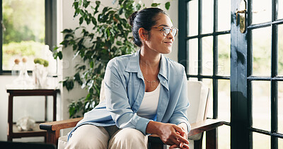 Buy stock photo Happy, woman and thinking with glasses, home and memory on break, thoughtful and decision in lounge. Daydreaming, person and smile with eyewear on weekend, remember and relax with nostalgia or wonder