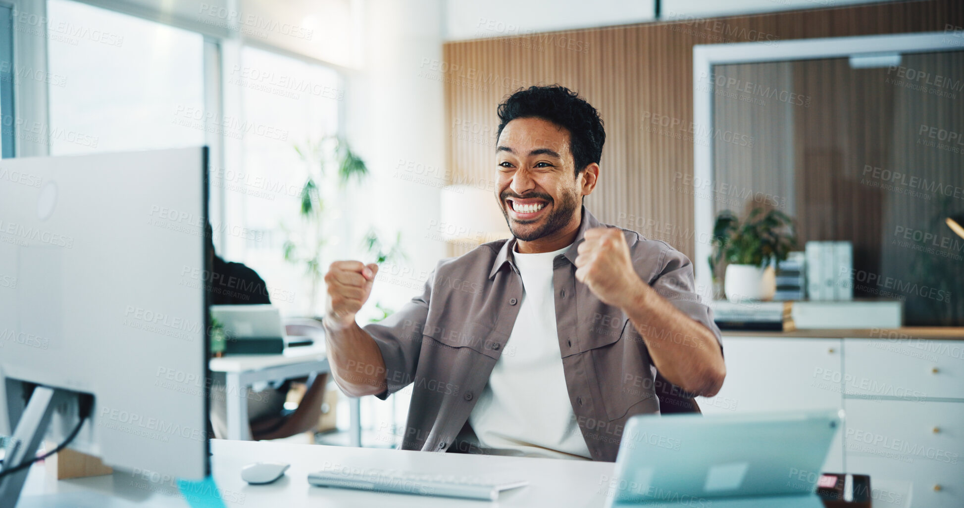 Buy stock photo Man, fist pump and celebration with computer at office for goal, promotion or bonus at media company. Person, writer and excited for success with achievement, announcement or notification at agency