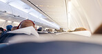 Airplane, cabin and people in row for trip with flying, transportation services or global journey. Plane, group and passenger on international flight, tourism or relax with back on airline for travel