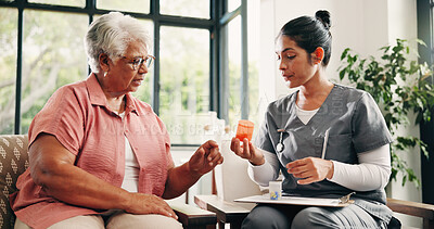 Buy stock photo Old woman, caregiver and advice in nursing home with pills, clipboard and medical discussion for health. Senior person, nurse and talk in retirement center with medicine, prescription and checklist.