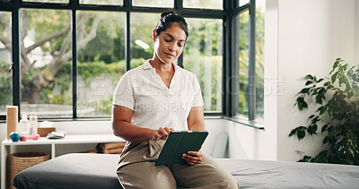 Buy stock photo Woman, physiotherapist and schedule with tablet in room for online booking or appointment. Female person, therapist and reading with technology for checklist, agenda or planning in recovery clinic