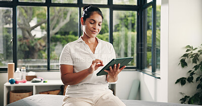 Buy stock photo Physiotherapist, reading or woman with tablet in clinic, appointment schedule or admin for patient record. Review, telehealth or employee with tech for rehabilitation research, email or medical info