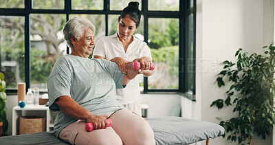 Buy stock photo Physiotherapy, dumbbells or senior woman in clinic, medical recovery evaluation or arm exercise. Help, specialist or old person with injury assessment for healing progress, weights or strength test