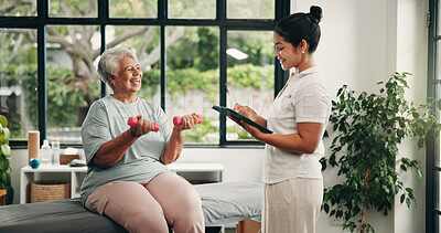 Buy stock photo Tablet, physiotherapist and old woman with dumbbells,  laugh and exercise in fitness clinic. Tech, physical therapy and weightlifting with senior patient for muscle recovery, rehabilitation or funny
