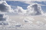 Space, white clouds and blue sky for weather pattern, atmosphere and climate. Natural, background and scenic view of skyline with aesthetic for texture, wallpaper and air environment in morning