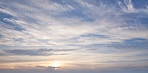Sunset, horizon and blue sky with clouds for weather, atmosphere and empty space. Natural, background and air with sunshine in evening for aesthetic, wallpaper and scenic view for nature or climate