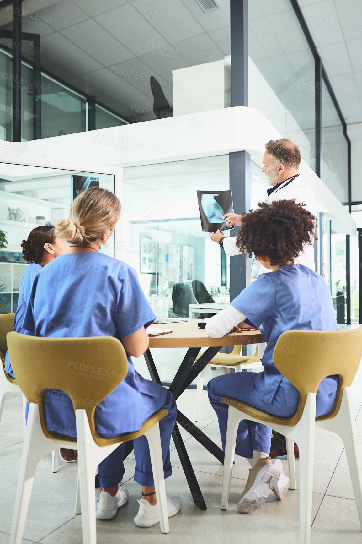 Buy stock photo Surgeon, meeting and nurses with xray in hospital for chest assessment, fracture analysis and diagnosis. People, healthcare and teamwork with lung scan, pulmonology radiography and medical treatment