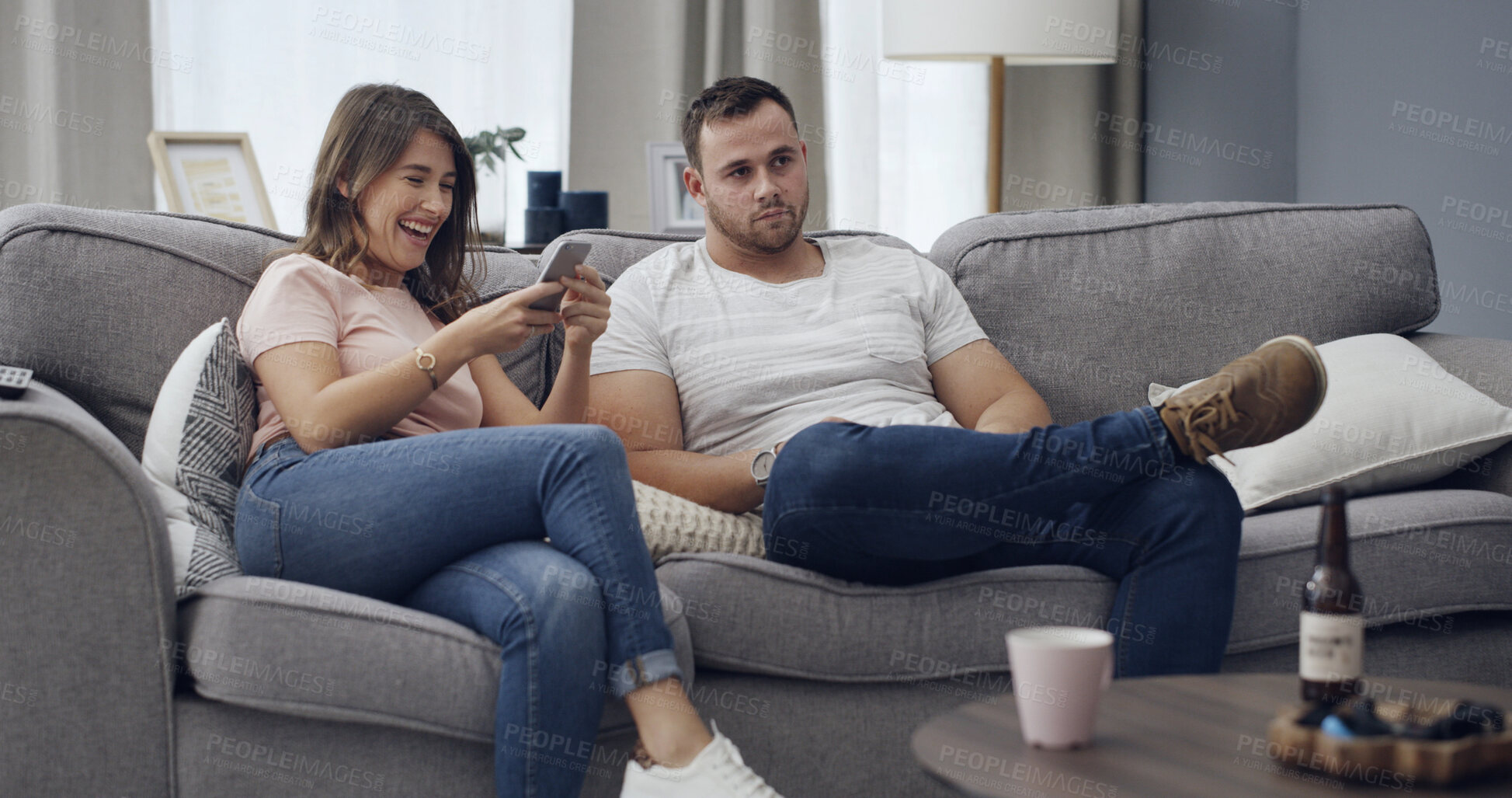 Buy stock photo Phone, upset and couple on sofa in home with texting, chatting or networking with conflict. Happy, argument and people with cellphone for contact on mobile app with fighting in living room at house.