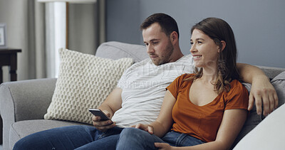 Buy stock photo Cellphone, relax and couple on sofa in home with texting, networking or chatting on mobile app. Technology, happy and man with woman on phone for social media together in living room at house.