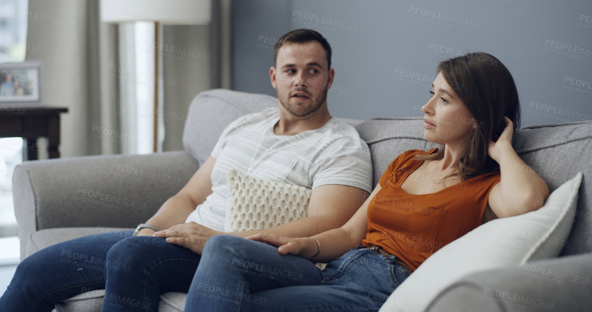 Buy stock photo Conversation, upset and couple on sofa in home with relationship problem, cheating or affair conflict. Serious, discussion and man with woman for marriage disagreement in living room at apartment.