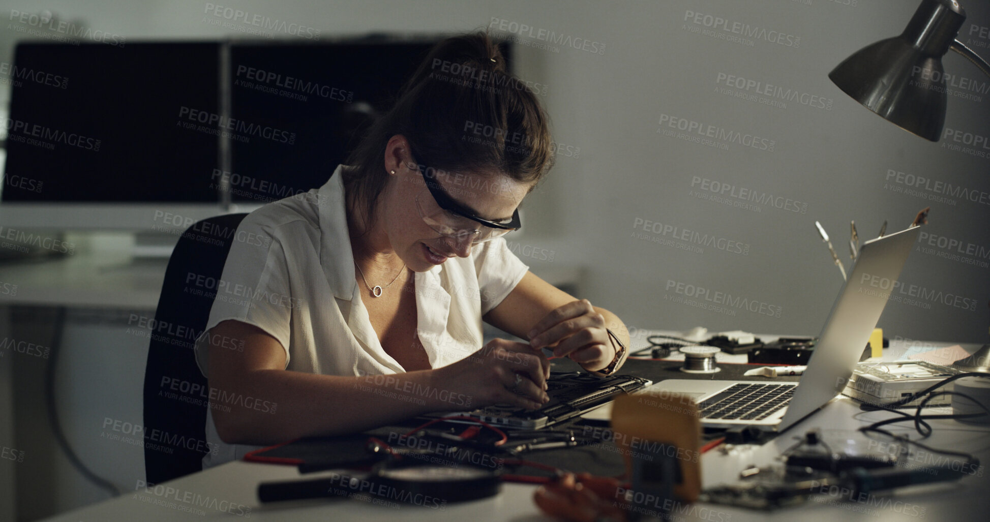 Buy stock photo Woman, technician and repair with laptop in workshop for IT service, maintenance or engineering. Female person, specialist or inspection with components for computer fix or hardware installation