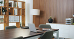 Laptop, documents and furniture in empty office for financial company, research and connectivity. Table, computer and paperwork in boardroom with network, finance report and technology for business