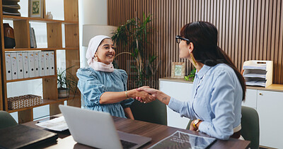 Buy stock photo Smile, handshake and laptop with business women in office for event planner, proposal or client feedback. Online, project management or startup with people in creative agency for deal or discussion