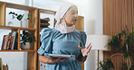 Muslim woman, tablet and speaker in office meeting at startup with review, insight and talk at media company. Islamic person, editor and tech with discussion, feedback and app at creative agency